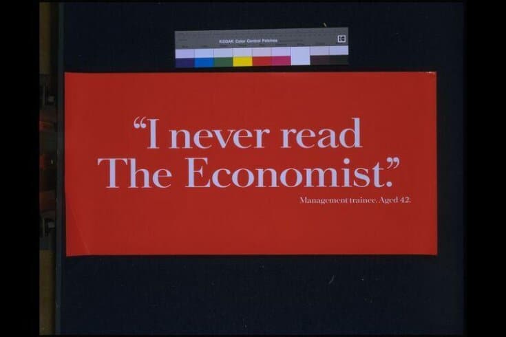 The Economist white-on-red poster — I never read The Economist, management trainee, aged 42