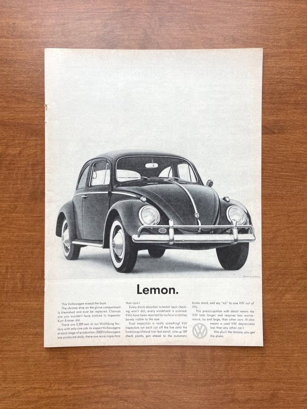 Volkswagen Lemon 1960 print ad with a Beetle above the single word Lemon