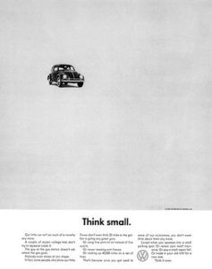 Volkswagen Think Small 1959 print ad showing a tiny Beetle in a sea of white space