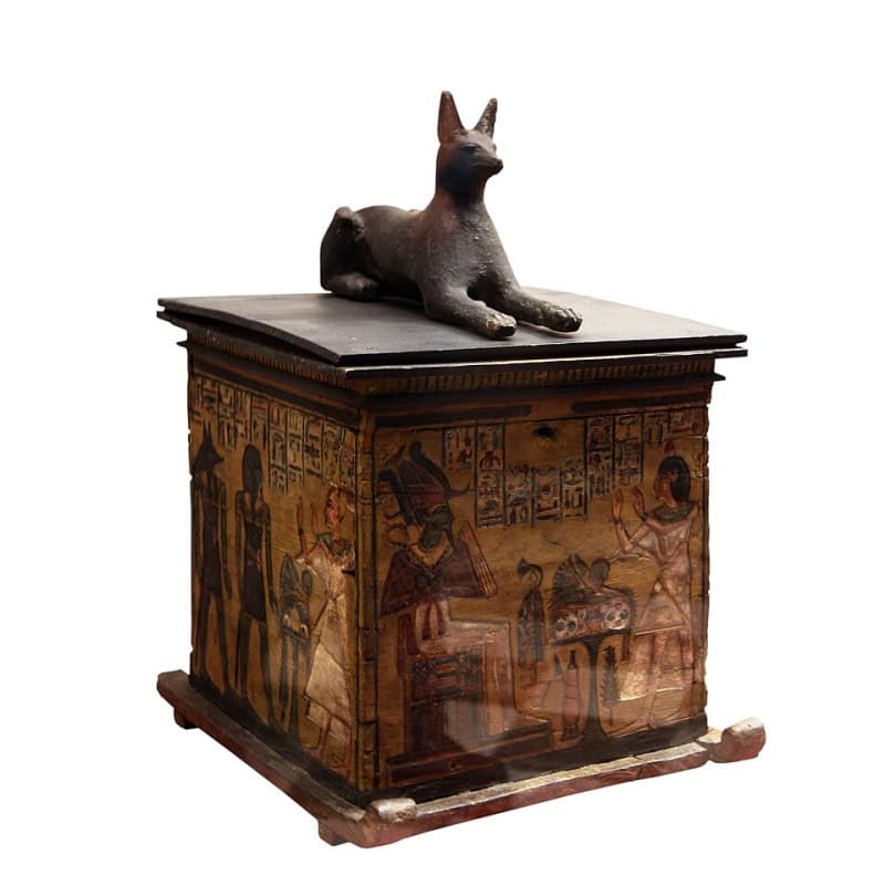 Painted wooden coffer topped by a recumbent black jackal figure of Anubis, from the Louvre collection