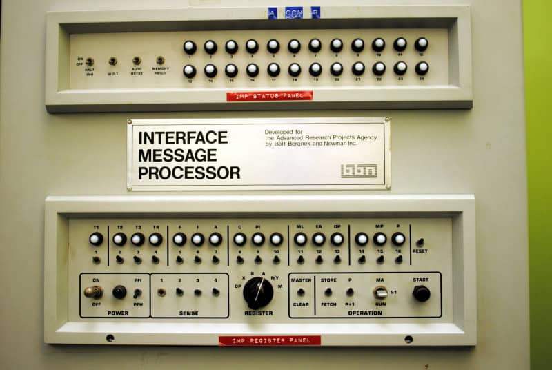 The front panel of an ARPANET Interface Message Processor, with two rows of indicator buttons and a nameplate reading "Interface Message Processor … Bolt Beranek and Newman Inc."