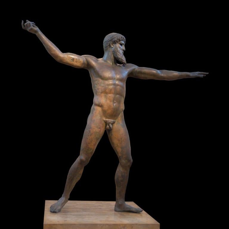 Bronze statue of a bearded god striding with both arms outstretched, poised to hurl a missing thunderbolt or trident