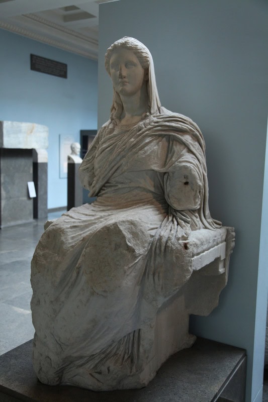 Seated marble Demeter in heavy drapery with a veil framing her face