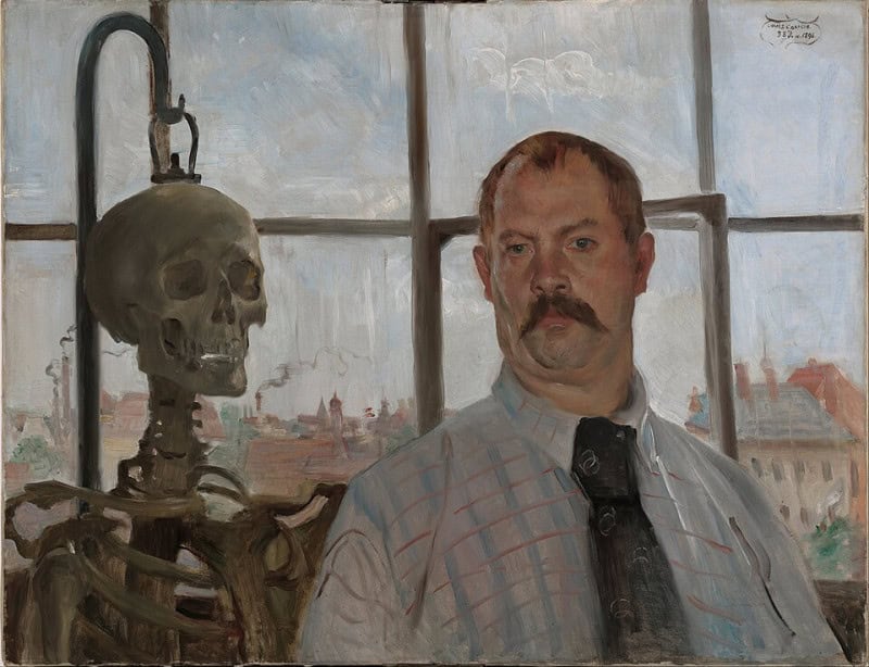 Moustached man in a pale checked shirt and dark patterned tie standing beside a hanging anatomical skeleton, in front of a wide studio window running the width of the picture, showing city rooftops under a pale sky