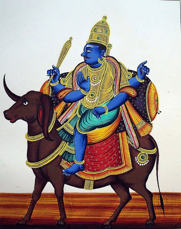 Painting of the four-armed blue-skinned Yama seated on a decorated buffalo, holding a staff in his upper right hand
