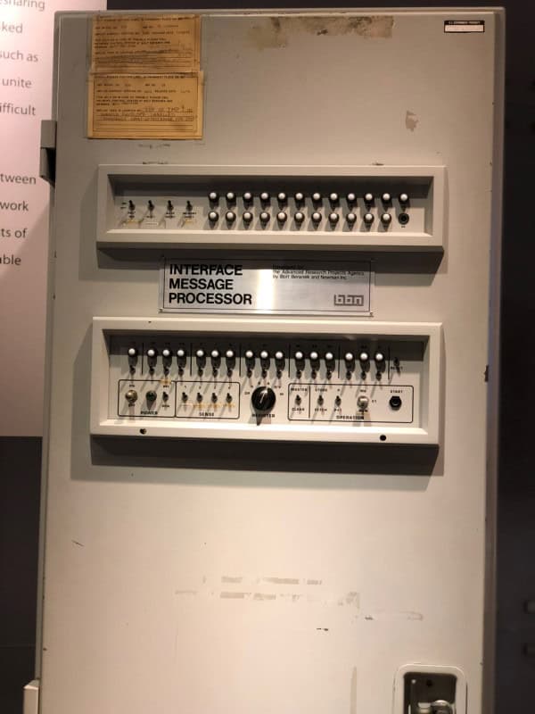 The front panel of a BBN Interface Message Processor, the ARPANET router, with rows of switches and lights