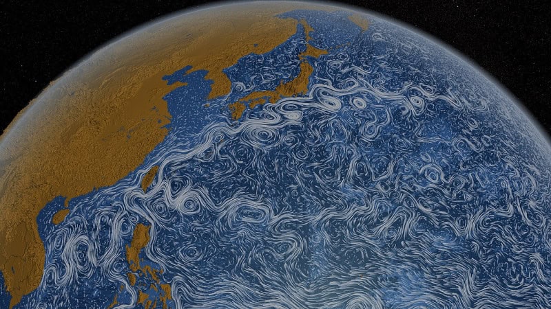 NASA visualisation of ocean surface currents around Japan, with the Kuroshio shown as swirling white streamlines against a dark blue sea