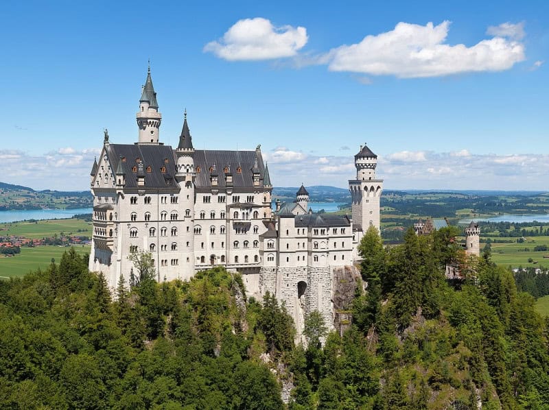 Neuschwanstein Castle on its hill above the Bavarian forest