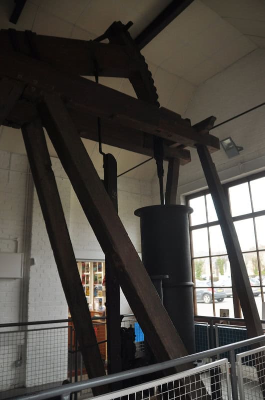 The Newcomen Memorial Engine at Dartmouth, an early eighteenth-century atmospheric beam engine with its wooden beam and open cylinder
