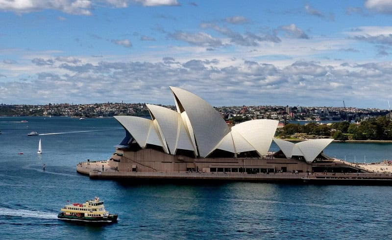 The Sydney Opera House and its white sail roofs on Sydney Harbour