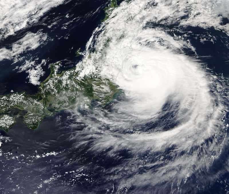 Satellite image of Typhoon Faxai, a broad spiral of white cloud with a clear eye, approaching the Japanese coast in September 2019