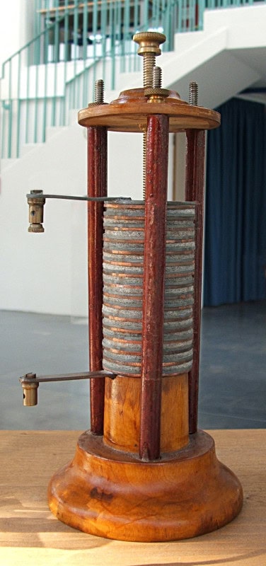 A voltaic pile, a column of stacked metal discs held in a wooden frame