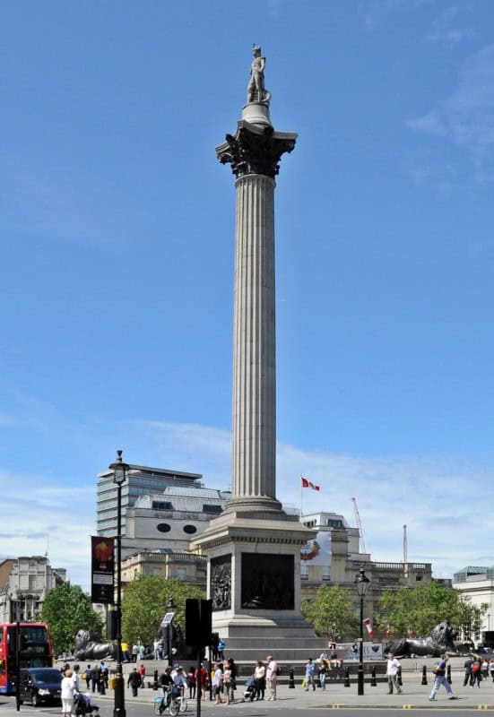 Nelson’s Column in Trafalgar Square, London, with the statue of Nelson against a blue sky